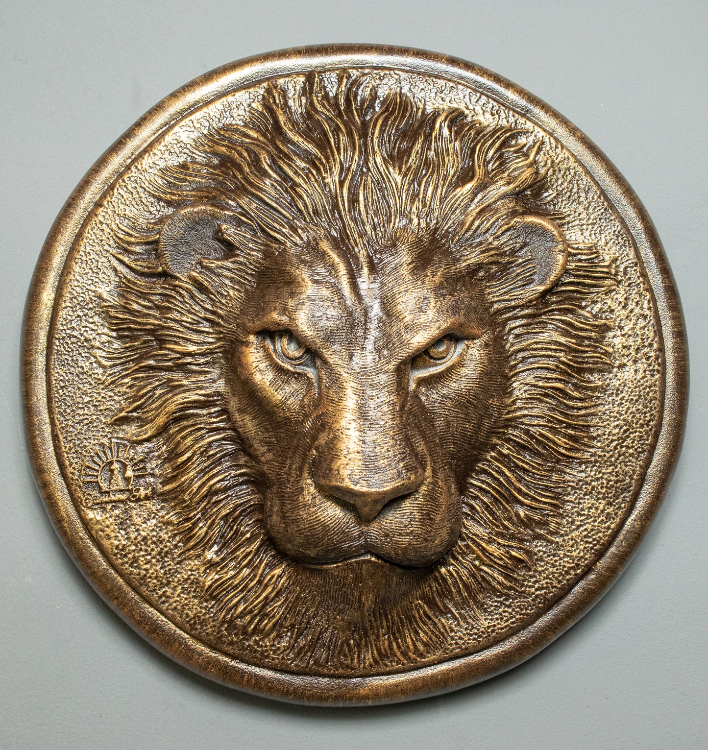 Whimsical lion face wall decoration with vivid hues and abstract elements, adding a touch of surrealism to any space